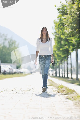 Image of young woman havefun at street 