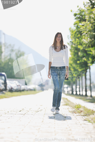 Image of young woman havefun at street 