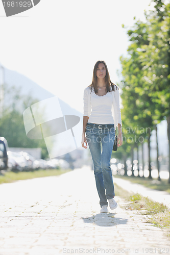 Image of young woman havefun at street 