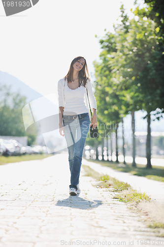 Image of young woman havefun at street 