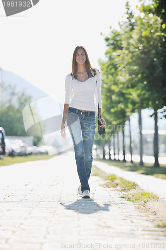 Image of young woman havefun at street 