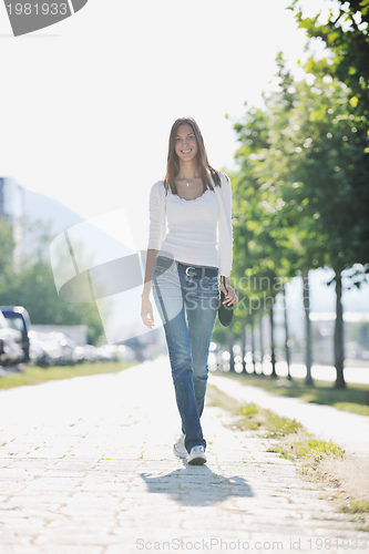 Image of young woman havefun at street 