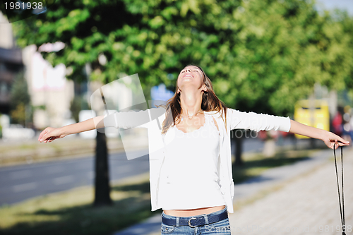 Image of young woman havefun at street 