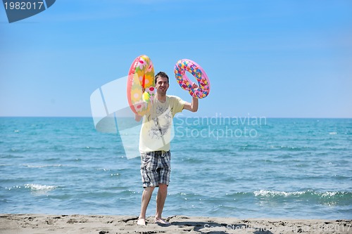 Image of man relax on beach