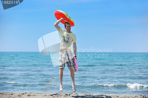 Image of man relax on beach