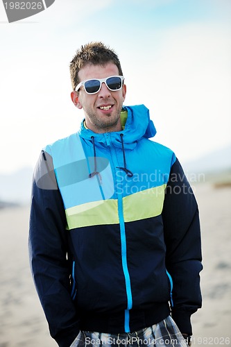 Image of man relax on beach