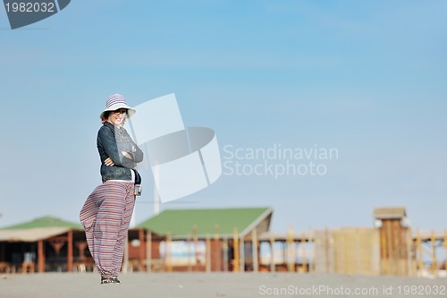 Image of young woman relax  on beach