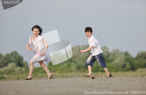 Image of kids playing on beach