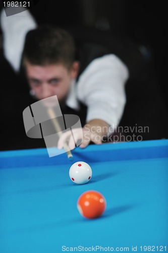 Image of young man play pro billiard game 