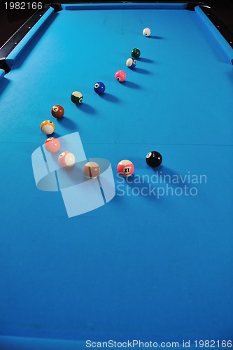 Image of young man play pro billiard game 