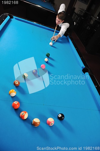 Image of young man play pro billiard game 