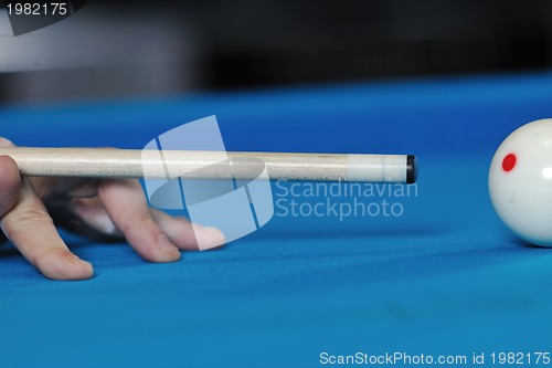 Image of young man play pro billiard game 