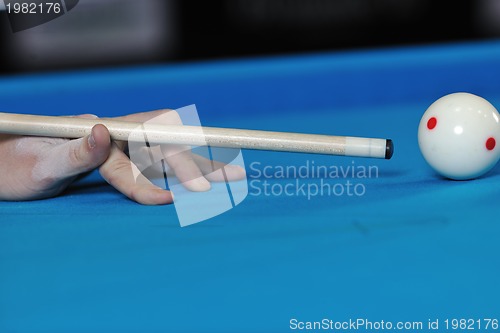 Image of young man play pro billiard game 