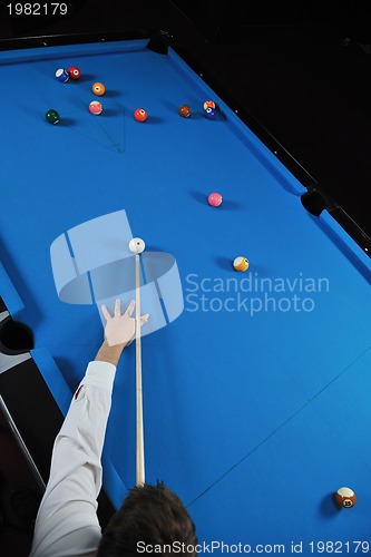 Image of young man play pro billiard game 