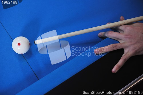 Image of young man play pro billiard game 