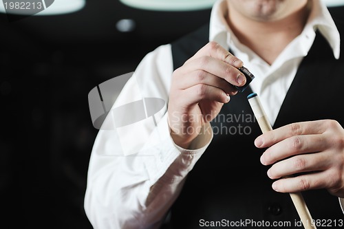 Image of young man play pro billiard game 