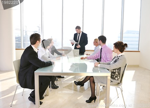 Image of group of business people at meeting