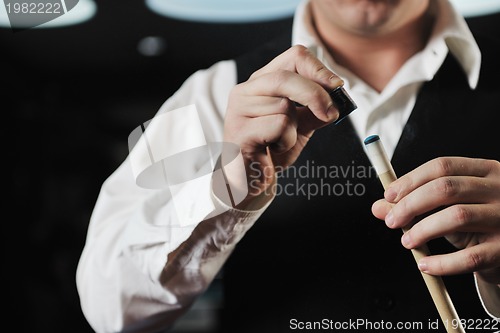 Image of young man play pro billiard game 