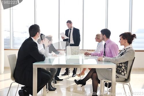 Image of group of business people at meeting