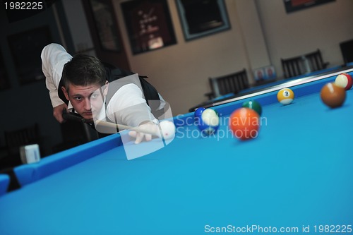 Image of young man play pro billiard game 