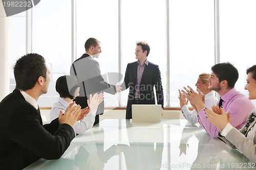 Image of group of business people at meeting