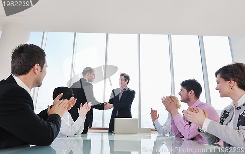 Image of group of business people at meeting