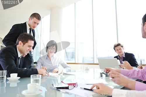 Image of group of business people at meeting