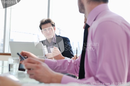 Image of group of business people at meeting