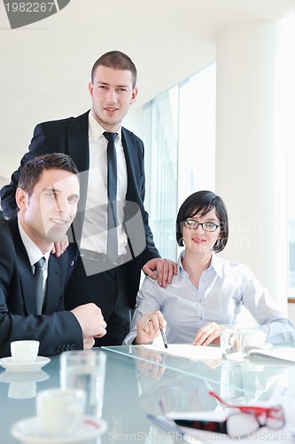 Image of group of business people at meeting