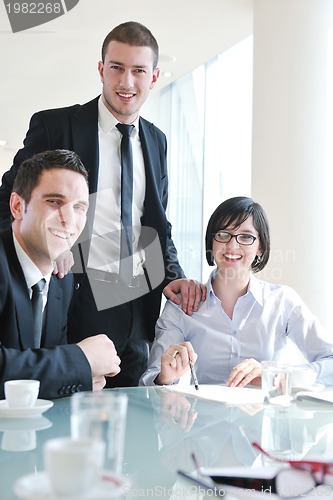 Image of group of business people at meeting