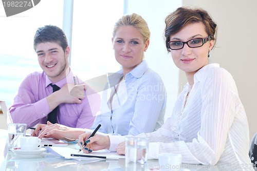 Image of group of business people at meeting