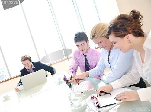 Image of group of business people at meeting