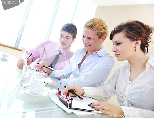 Image of group of business people at meeting