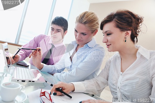Image of group of business people at meeting
