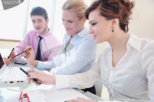 Image of group of business people at meeting