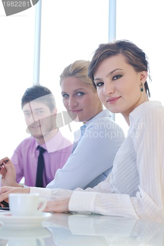 Image of group of business people at meeting