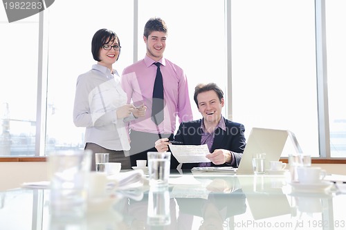 Image of group of business people at meeting