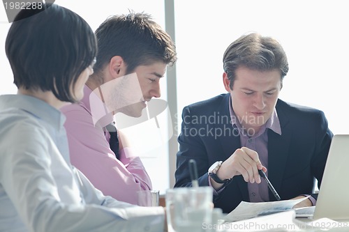 Image of group of business people at meeting