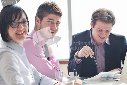 Image of group of business people at meeting