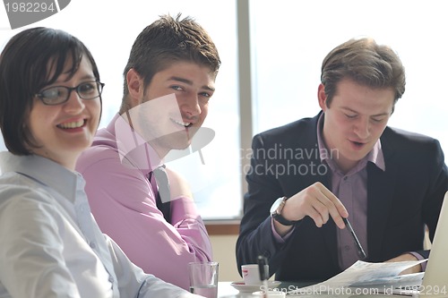 Image of group of business people at meeting