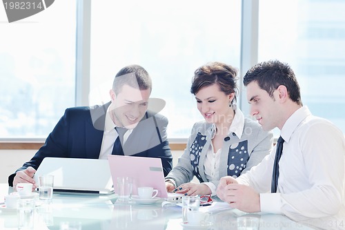 Image of group of business people at meeting