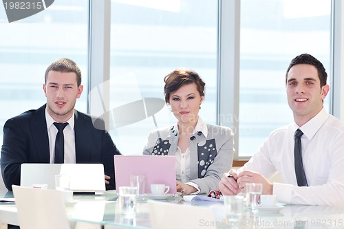 Image of group of business people at meeting