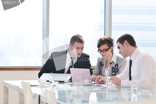 Image of group of business people at meeting