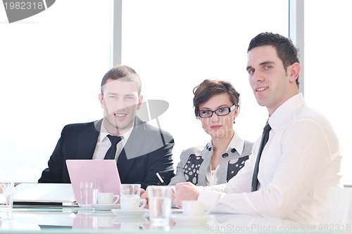 Image of group of business people at meeting