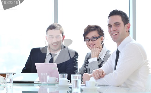 Image of group of business people at meeting