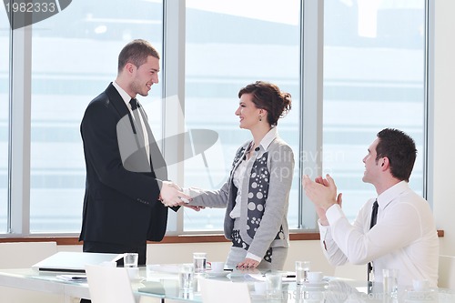 Image of group of business people at meeting