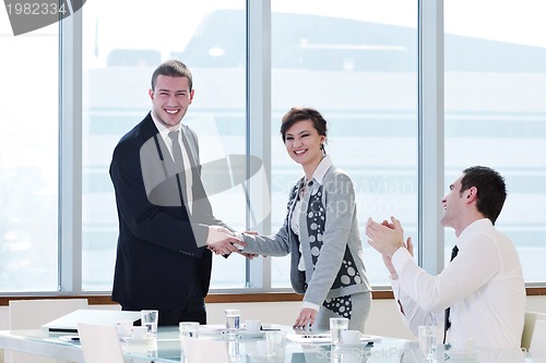 Image of group of business people at meeting