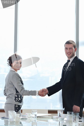 Image of business man and woman handshake on  meeting