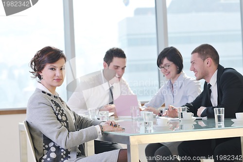 Image of group of business people at meeting