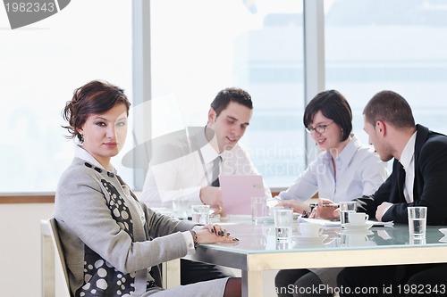 Image of group of business people at meeting